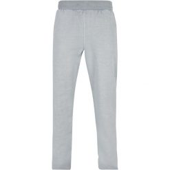 Grube joggery z rozcięciem, barwione w dresie Urban Classics. Niebieskie joggery i bojówki Urban Classics, m, bez wzorów, z dresówki. Za 275.00 zł.
