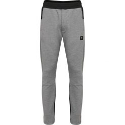 Spodnie Hummel slim Tropper. Szare szorty Hummel, m, bez wzorów, sportowe. Za 232.00 zł.
