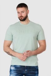 GUESS Pistacjowy t-shirt męski z wytłaczanym logo. Zielone t-shirty Guess, m, z aplikacjami, bez kołnierzyka, bez ramiączek. W wyprzedaży za 109.99 zł.