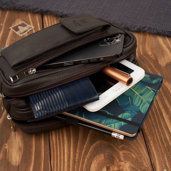 Saszetka męska do ręki skórzana dwukomorowa brązowa Paolo Peruzzi T-131-BR. Brązowe torby na ramię bez wzorów, z materiału, do ręki, bez dodatków. Za 129.00 zł.