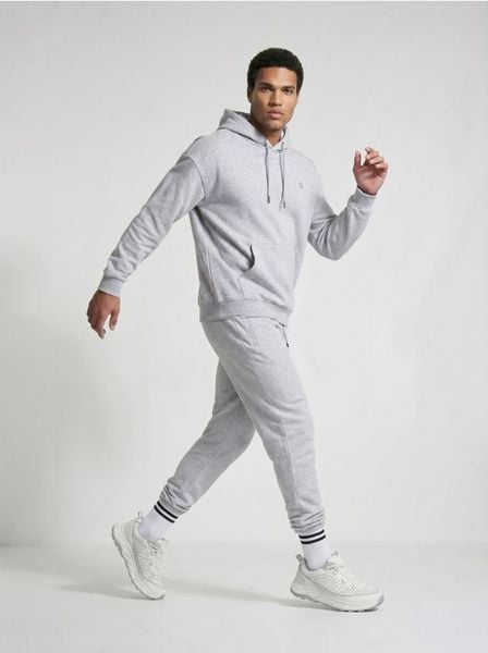 Bluza sportowa z kapturem SNSY PERFORMANCE - szary. Szare bluzy z kapturem Sinsay, l, bez wzorów, z kapturem. Za 79.99 zł.