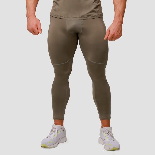 Legginsy męskie do biegania slim Pulse. Zielone legginsy długie sportowe GYMBEAM, m, bez wzorów, z elastanu, do biegania. Za 127.90 zł.