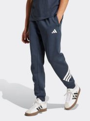Adidas Spodnie dresowe w kolorze granatowym rozmiar: M. Niebieskie spodnie treningowe długie Adidas, m, bez wzorów, z dresówki. Za 188.40 zł.
