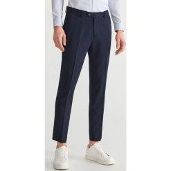 Garniturowe spodnie super slim - Granatowy. Garnitury Reserved. Za 129.99 zł.