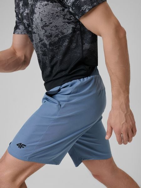 4F Spodenki treningowe szybkoschnące męskie - granatowe M. Niebieskie krótkie spodenki sportowe 4F, m, bez wzorów, z materiału. Za 99.99 zł.