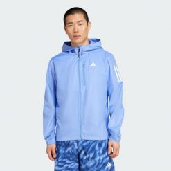 Kurtka Own The Run. Niebieskie kurtki Adidas, xl, bez wzorów, z materiału, bez kaptura. Za 308.15 zł.