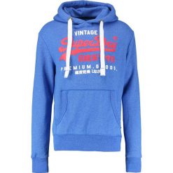 Superdry PREMIUM GOODS DUO HOOD Bluza z kapturem jet blue grit. Bluzy marki Superdry. W wyprzedaży za 305.10 zł.