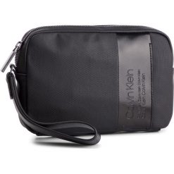 Saszetka CALVIN KLEIN - Elevated Compact Case K50K504448 001. Saszetki i nerki marki CALVIN KLEIN. Za 299.00 zł.