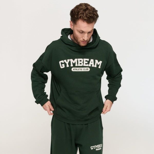 Bluza męska fitness z kapturem oversize Varsity. Zielone bluzy z kapturem GYMBEAM, m, bez wzorów, z bawełny, z kapturem. Za 139.90 zł.