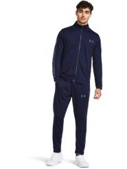 Under Armour 2-częściowy strój sportowy w kolorze granatowym rozmiar: L. Niebieskie spodnie treningowe długie Under Armour, l, bez wzorów, z dresówki. Za 192.33 zł.