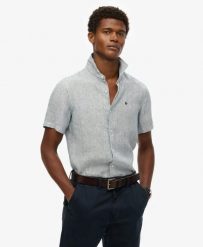 Superdry Haftowana lniana koszula Vacation – Navy Ticking Linen. Niebieskie koszule Superdry, na lato, l, bez wzorów, ze lnu, bez kołnierzyka, bez ramiączek. Za 287.50 zł.