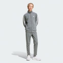 Dres męski adidas Basic 3-Stripes Tricot. Białe komplety dresowe Adidas, m, bez wzorów, z dresówki, bez ramiączek. W wyprzedaży za 279.20 zł.