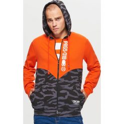 Zapinana bluza z kapturem kolekcja PROGRESS - Pomarańczowy. Bluzy z kapturem marki DOMYOS. Za 139.99 zł.