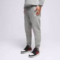 Męskie spodnie sportowe Air Jordan Essentials Fleece Pants FJ7779-091. Szare spodnie treningowe długie Jordan, m, bez wzorów, z dresówki. Za 263.35 zł.