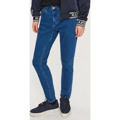 Klasyczne jeansy slim fit - Granatowy. Jeansy marki Reserved. W wyprzedaży za 39.99 zł.