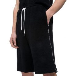 Calvin Klein Męskie szorty Toweling Short KM0KM00323-001 Black (rozmiar L). Czarne odzież kąpielowa CALVIN KLEIN, l, bez wzorów. W wyprzedaży za 149.00 zł.