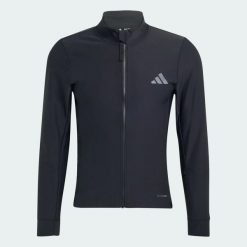 ZIMOWA KURTKA DO JAZDY NA ROWERZE CLIMAWARM. Czarne kurtki Adidas, na zimę, l, bez wzorów, z dzianiny, bez kaptura. Za 799.00 zł.