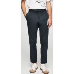 Mango Man - Spodnie Berlin1. Eleganckie spodnie marki Mango Man. W wyprzedaży za 99.90 zł.