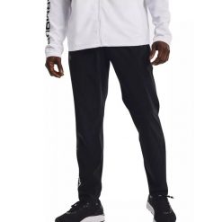 Spodnie treningowe męskie Under Armour Storm Run. Czarne spodnie narciarskie i snowboardowe Under Armour, m, bez wzorów, narciarskie. Za 129.99 zł.
