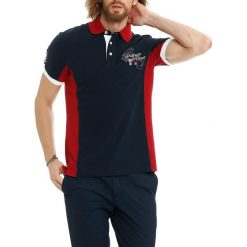 Koszulka polo w kolorze czerwono-ciemnoniebieskim. Koszulki polo marki Galvanni, z nadrukiem, polo, z krótkim rękawem. W wyprzedaży za 229.95 zł.