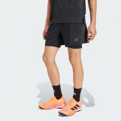 Szorty TECH ESSENTIALS WORKOUT 2 w 1. Czarne szorty Adidas, bez wzorów, sportowe. Za 239.00 zł.