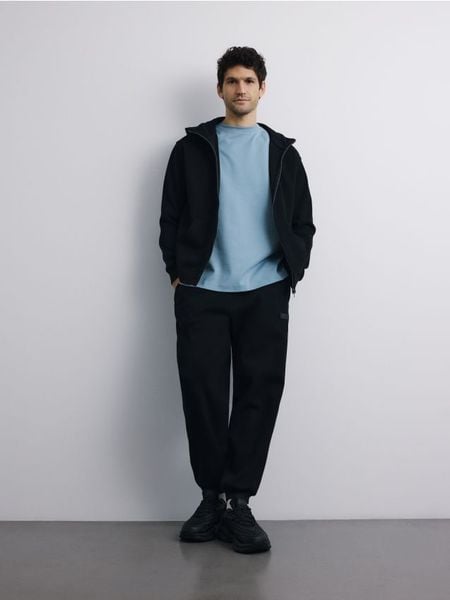 Rozpinana bluza z kapturem - czarny. Czarne bluzy z kapturem Reserved, l, bez wzorów, z dzianiny, z kapturem. Za 139.99 zł.