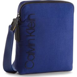 Saszetka CALVIN KLEIN - Strapped Mini Reporter K50K503777 447. Saszetki i nerki marki CALVIN KLEIN. W wyprzedaży za 229.00 zł.