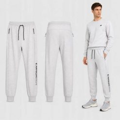 SPODNIE MĘSKIE DRESOWE 4F JOGGERY SPORTOWE SZARE. Szare joggery i bojówki 4F, m, bez wzorów, z bawełny, sportowe. Za 159.99 zł.