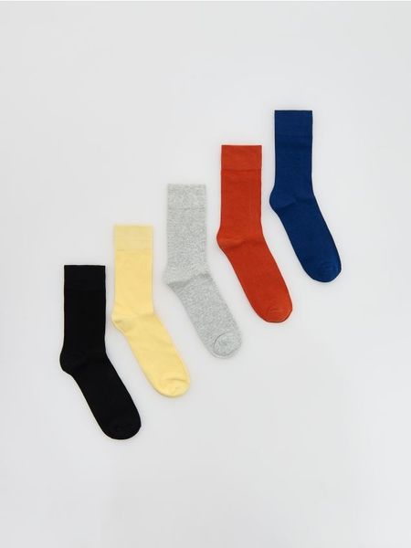 5 pack skarpet - jasnożółty. Żółte skarpety Reserved, bez wzorów. W wyprzedaży za 22.99 zł.