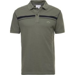 Lacoste Koszulka polo armee/marine. Koszulki polo marki LACOSTE. W wyprzedaży za 363.30 zł.