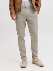 Jack & Jones Spodnie chino "Pstmarco" w kolorze beżowym rozmiar: W31/L34. Brązowe eleganckie spodnie Jack & Jones, l, ze skóry. Za 127.65 zł.