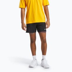 Spodenki Reebok Athlete Hype 2-IN-1. Czarne szorty REEBOK FITNESS, bez wzorów, sportowe. Za 209.99 zł.