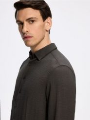 Koszula regular fit - ciemnozielony. Zielone koszule Reserved, l, bez wzorów, z tkaniny, bez kołnierzyka, bez ramiączek. Za 129.99 zł.