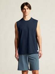 Craft Top "Collective Relaxed" w kolorze granatowym rozmiar: L. Niebieskie bezrękawniki Craft, l, bez wzorów, z bawełny, bez kołnierzyka, bez ramiączek. Za 81.95 zł.