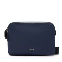 Saszetka Calvin Klein. Niebieskie saszetki i nerki CALVIN KLEIN, bez wzorów. Za 279.99 zł.