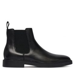 Sztyblety Guess. Czarne botki sznurowane Guess, z aplikacjami, bez obcasa, bez zapięcia. Za 674.99 zł.