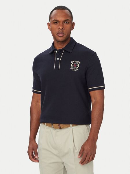 Guess Polo M6YP17 K4398 Granatowy Regular Fit. Niebieskie koszulki polo Guess, l, z aplikacjami, z bawełny, bez kołnierzyka, bez ramiączek. Za 344.99 zł.
