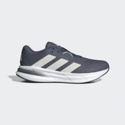 Buty Galaxy 7 Running. Białe buty do biegania Adidas, bez wzorów, z syntetyku, bez zapięcia, do biegania. Za 239.00 zł.