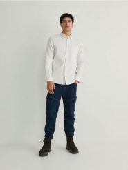 Koszula comfort fit - złamana biel. Koszule Reserved, l, bez wzorów, z bawełny, bez kołnierzyka, bez ramiączek. Za 119.99 zł.