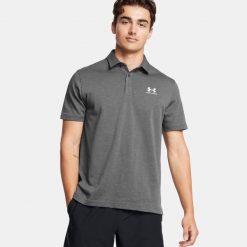 Koszulka polo męska Under Armour UA Icon. Szare koszulki polo Under Armour, m, bez wzorów, bez kołnierzyka, bez ramiączek, na golfa. W wyprzedaży za 126.79 zł.