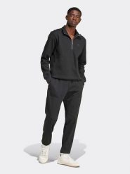 Adidas Spodnie dresowe w kolorze czarnym rozmiar: M. Czarne spodnie treningowe długie Adidas, m, bez wzorów, z dresówki. Za 158.47 zł.