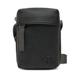 Saszetka Calvin Klein Jeans. Czarne saszetki i nerki Calvin Klein Jeans, bez wzorów, z jeansu. Za 229.99 zł.