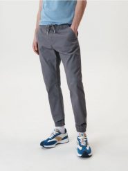 Spodnie jogger - szary. Szare joggery i bojówki Sinsay, bez wzorów, z bawełny. Za 49.99 zł.