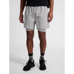 Szorty 2 w 1 Newline Fast. Szare buty do biegania Newline, bez wzorów, sportowe. Za 279.50 zł.