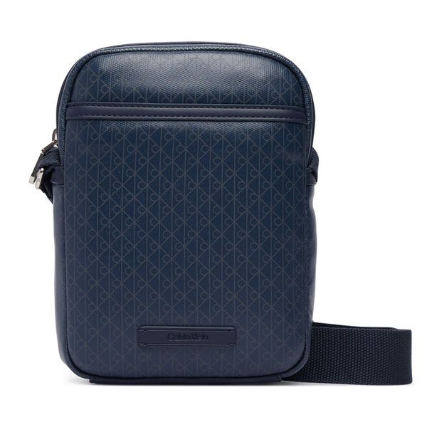 Saszetka Calvin Klein. Niebieskie saszetki i nerki CALVIN KLEIN, bez wzorów, małe, bez dodatków. Za 369.99 zł.