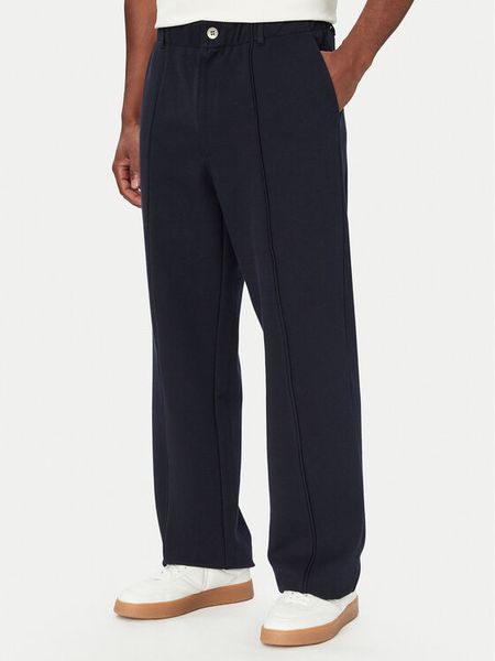 Guess Spodnie materiałowe M6YB13 K4252 Granatowy Regular Fit. Niebieskie spodnie materiałowe Guess, m, z aplikacjami, z materiału. Za 434.99 zł.