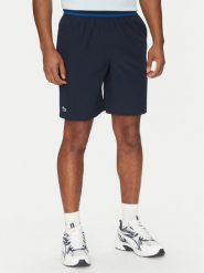 Lacoste Szorty sportowe GH7413 Granatowy Regular Fit. Niebieskie krótkie spodenki sportowe LACOSTE, m, bez wzorów, z syntetyku. Za 289.99 zł.