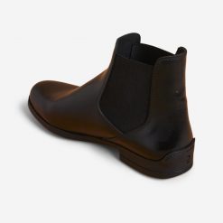 Sztyblety jeździeckie Fouganza 500 skórzane. Czarne sztyblety FOUGANZA, bez wzorów, ze skóry, bez obcasa, bez zapięcia. Za 199.99 zł.