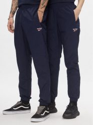 Reebok Spodnie dresowe Classics Vector Tracksuit Bottoms H54439 Niebieski Slim Fit. Niebieskie komplety dresowe Reebok, m, bez wzorów, z dresówki, bez ramiączek. Za 339.99 zł.