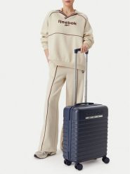 Reebok Walizka kabinowa CWBEO-RBK-MS-003-S Granatowy. Niebieskie walizki Reebok, bez wzorów, z tworzywa sztucznego. Za 279.99 zł.